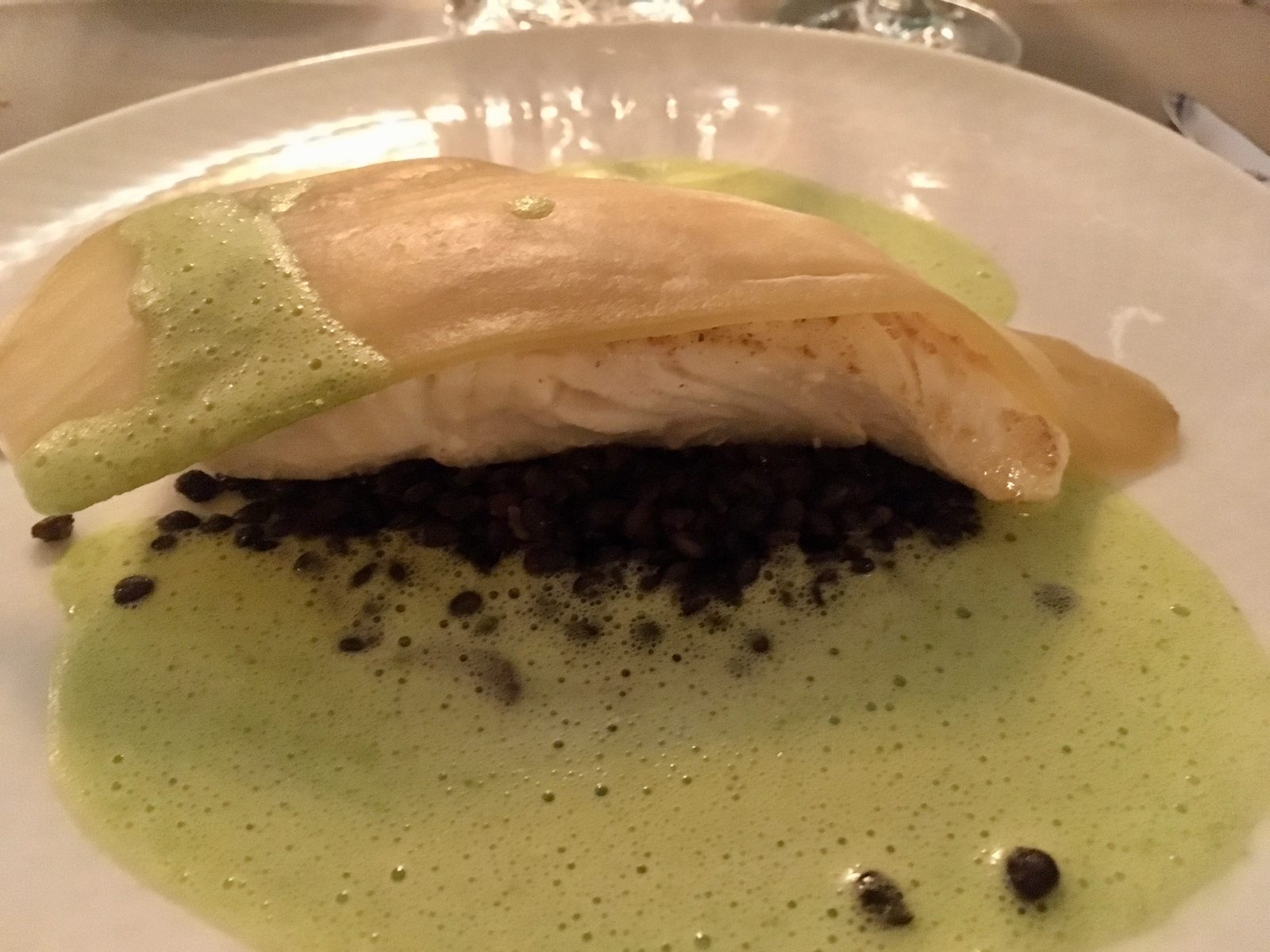 Heilbutt mit Berglinsen, Blutwurst und eingelegten Auberginen